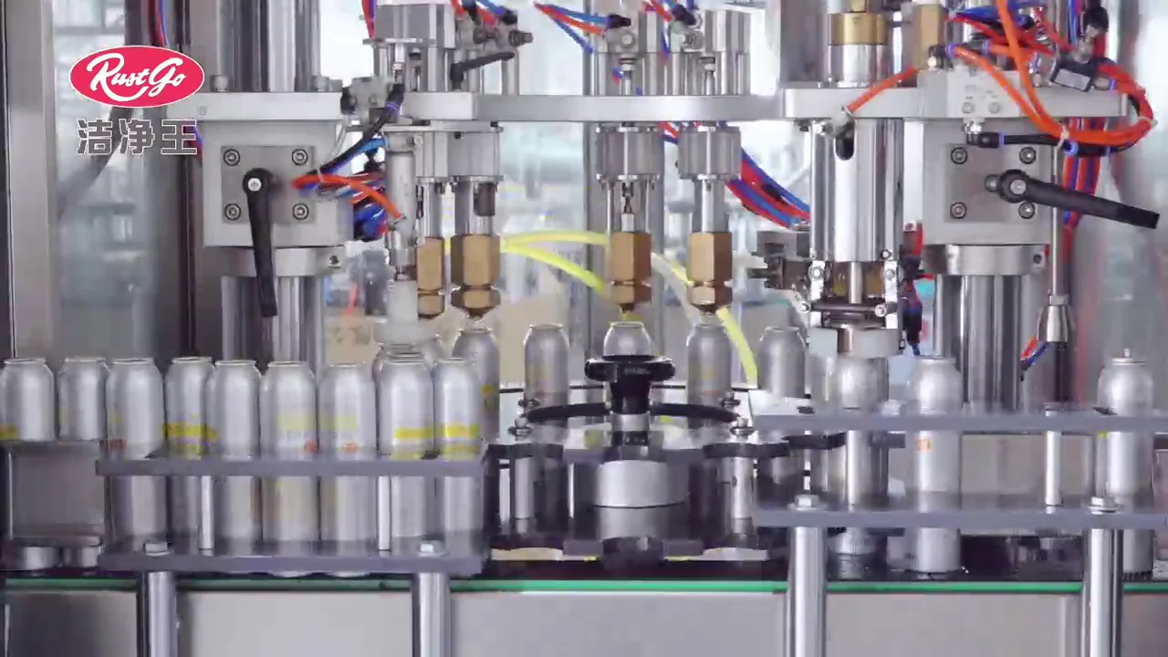 Aerosol cans moving through filling equipment in the company promotional film