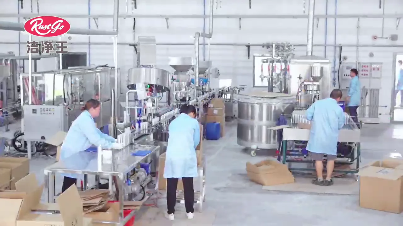 Workers and aerosol production equipment on the RustGo factory floor
